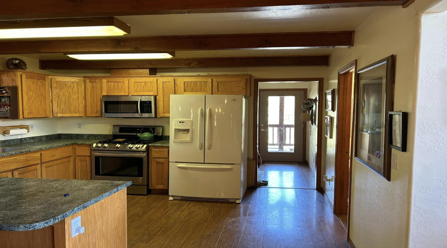 38 kitchen showing walk way to laundry a