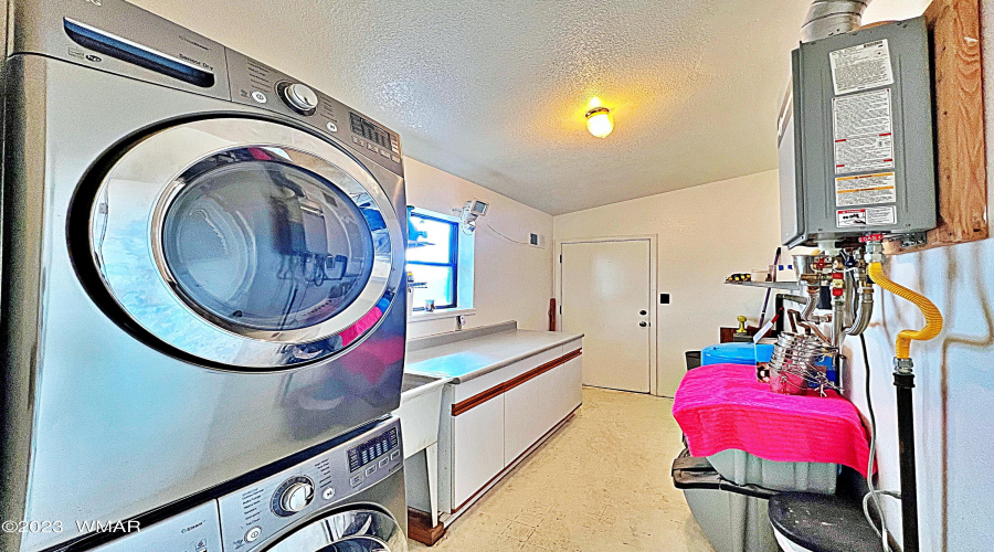 Laundry Room; on-demand water heater.