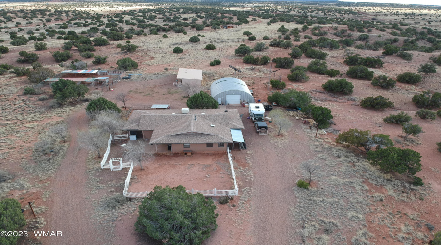 Aerial view of house & structures