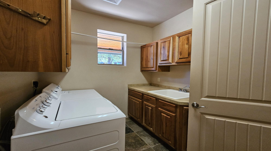 LAUNDRY ROOM WITH CABINETS