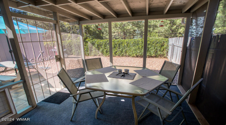 Screened-in covered back patio