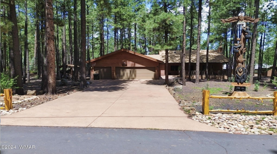 Front of home in the pines