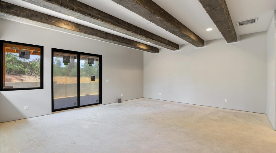 Primary Bedroom with Beamed Ceiling