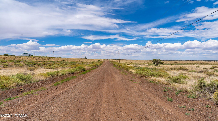 MAIN ROAD W PROP ON LEFT