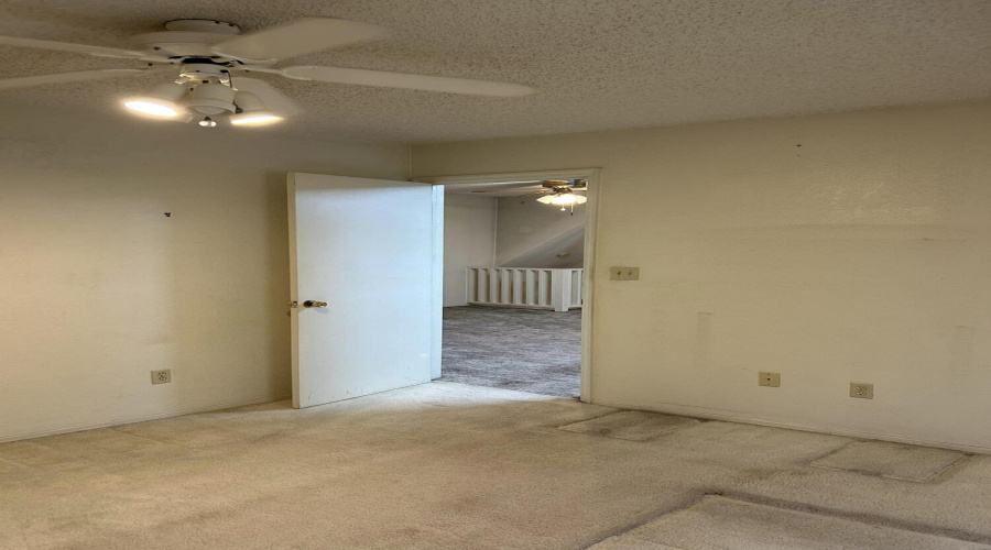 upstairs bedroom looking to door to livi