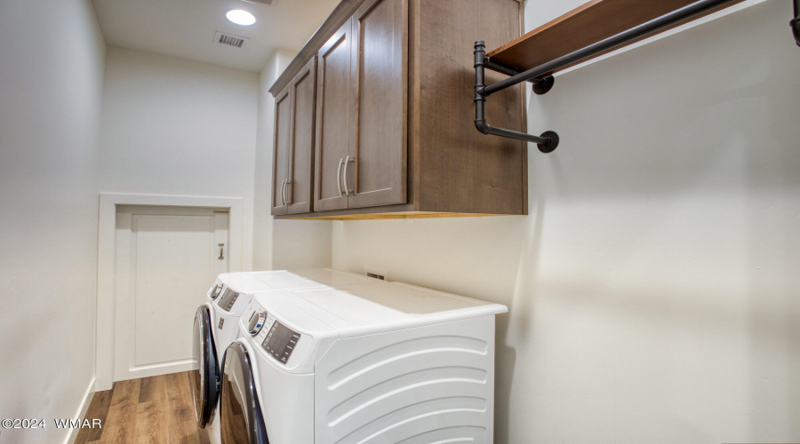 Laundry with cabinets