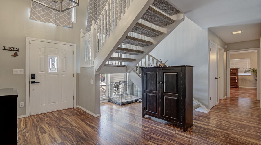 enterance to living room and upstairs