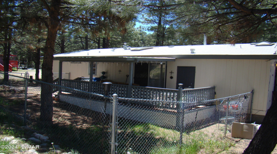 Covered deck fenced yard