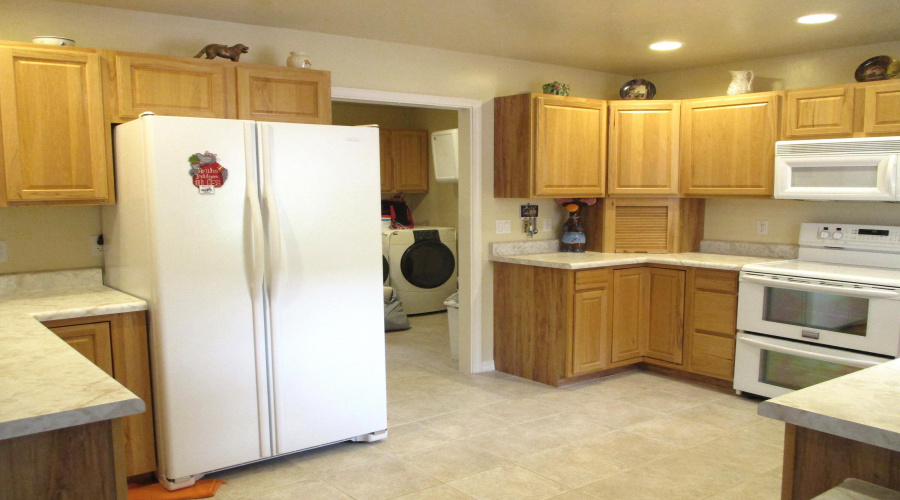 Kitchen to Utility Room & Half Bath