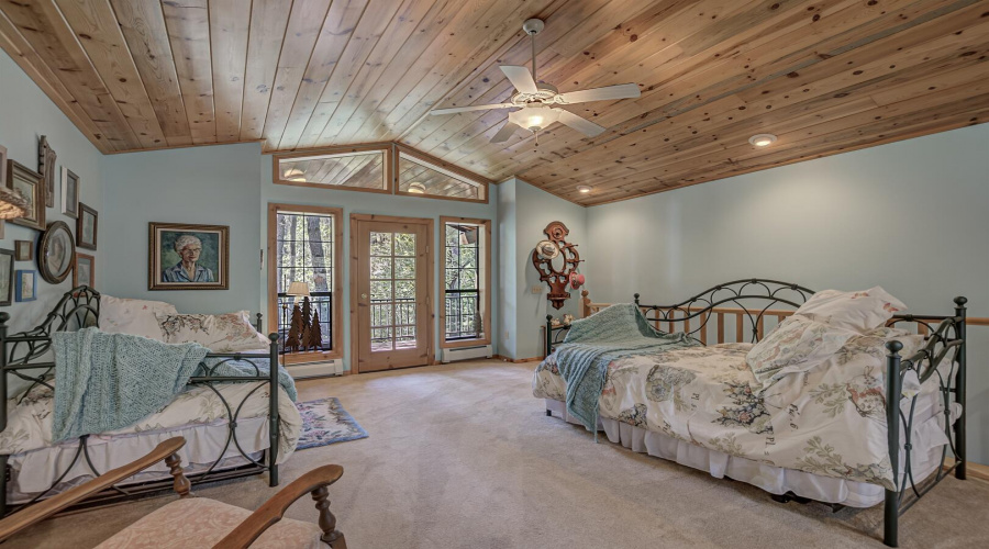 Upstairs bedroom looking at french doors