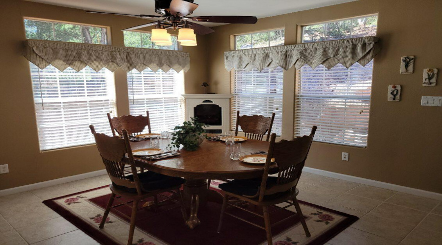 Family dining by the fireplace