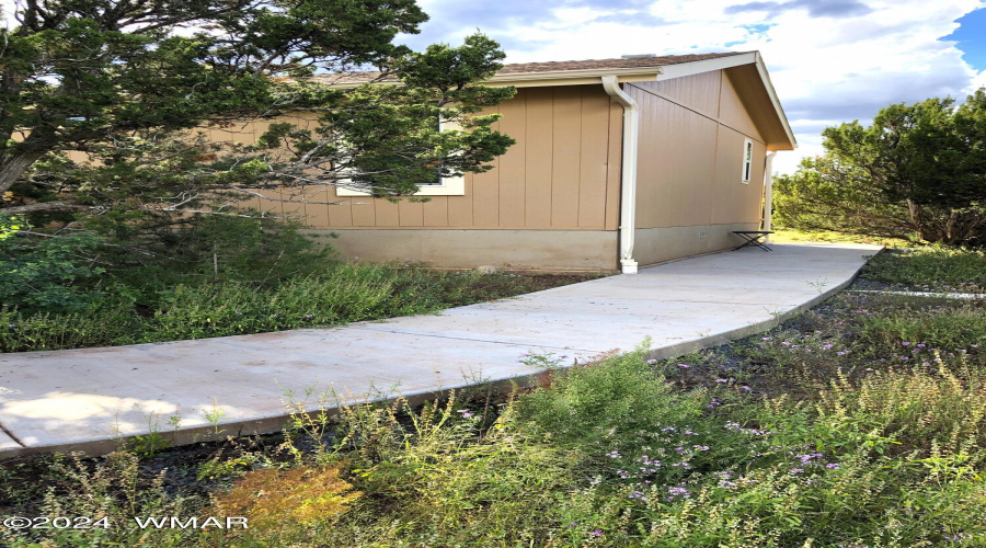 Center sidewalk to ramp North Side