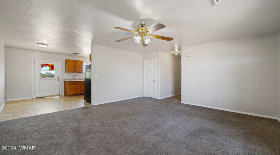 Living room facing kitchen