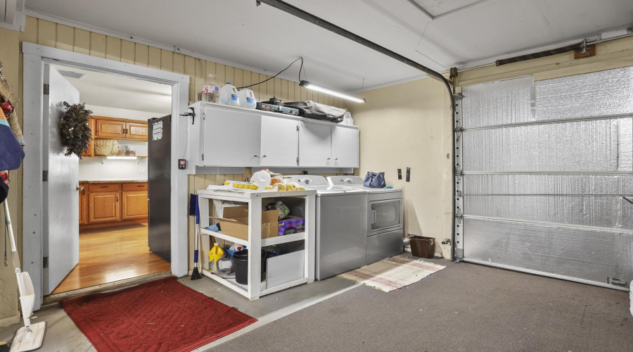 Laundry in the garage off kitchen