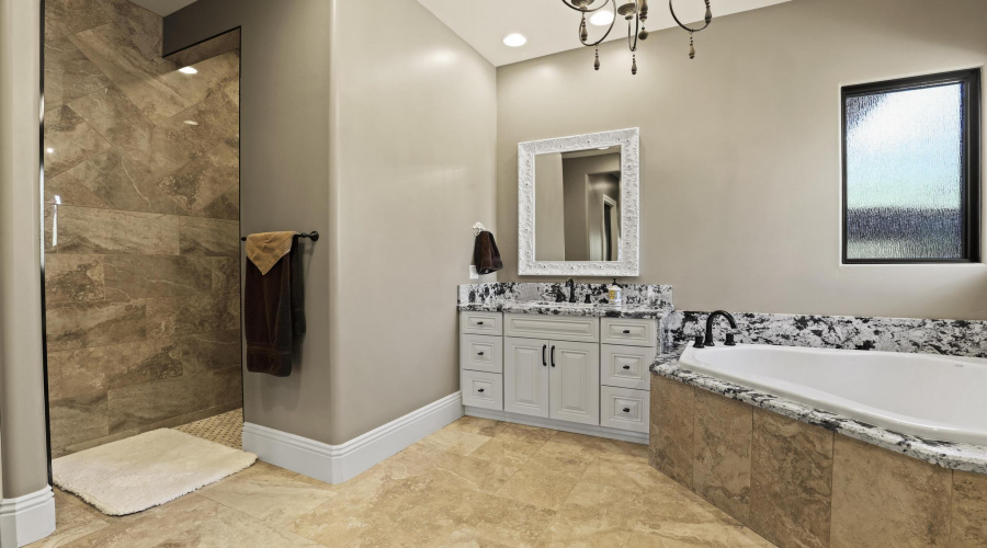 Separate Dual Vanities and Soaking Tub