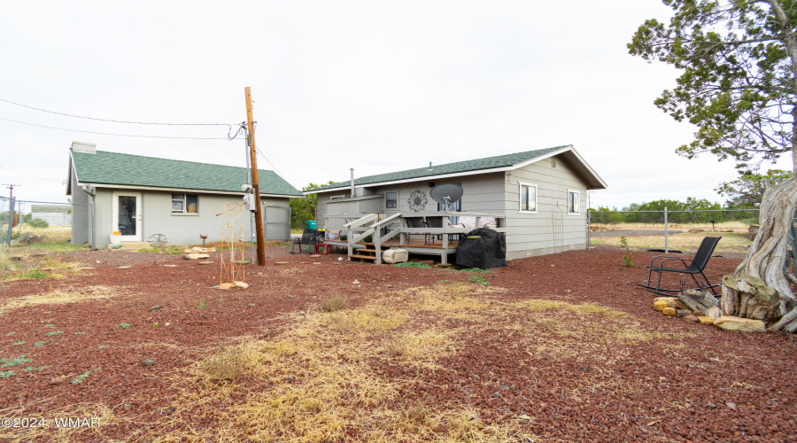 Backyard looking back at home & garage