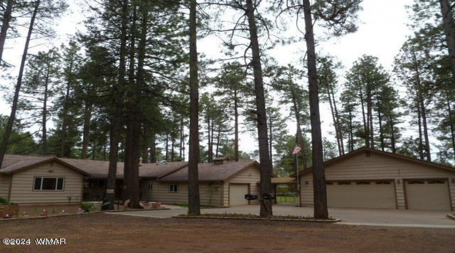 McAdam front with 3 car garage view