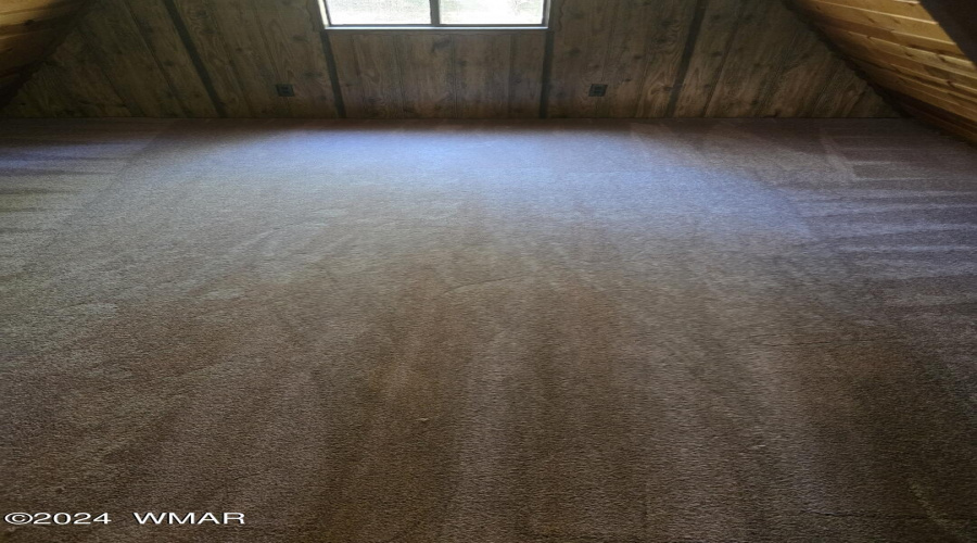 loft with new carpet installed