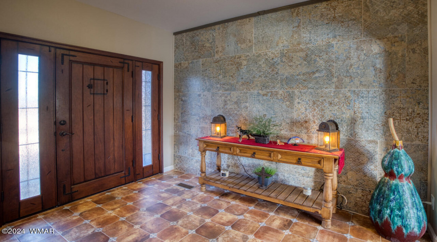 Foyer with Tile on Wall and Floors