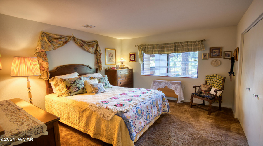 Bedroom with forest Views