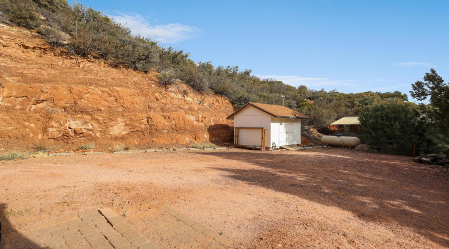 Parking area and storage shed