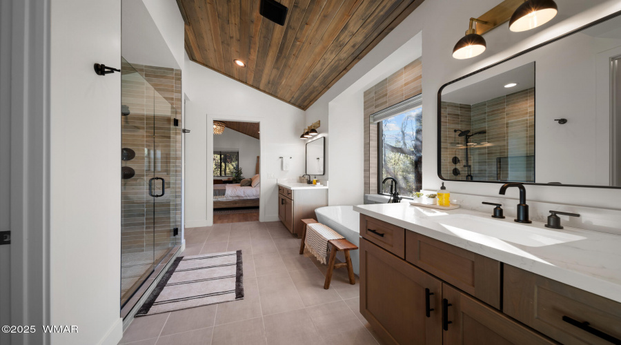 View Of Master Bathroom Towards Bedroom