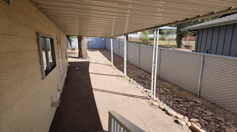 CARPORT LOOKING EAST