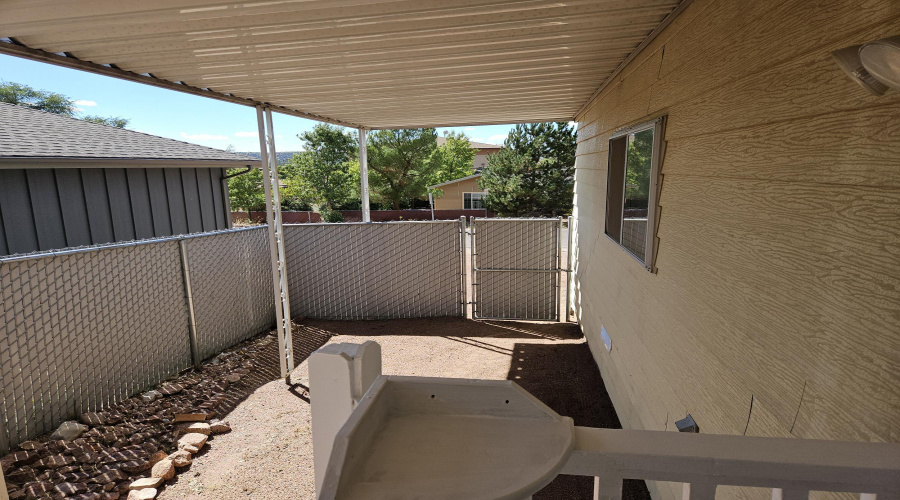 CARPORT LOOKING WEST