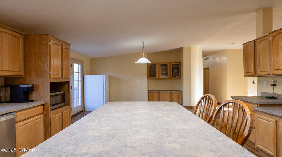 Kitchen looking to Dining