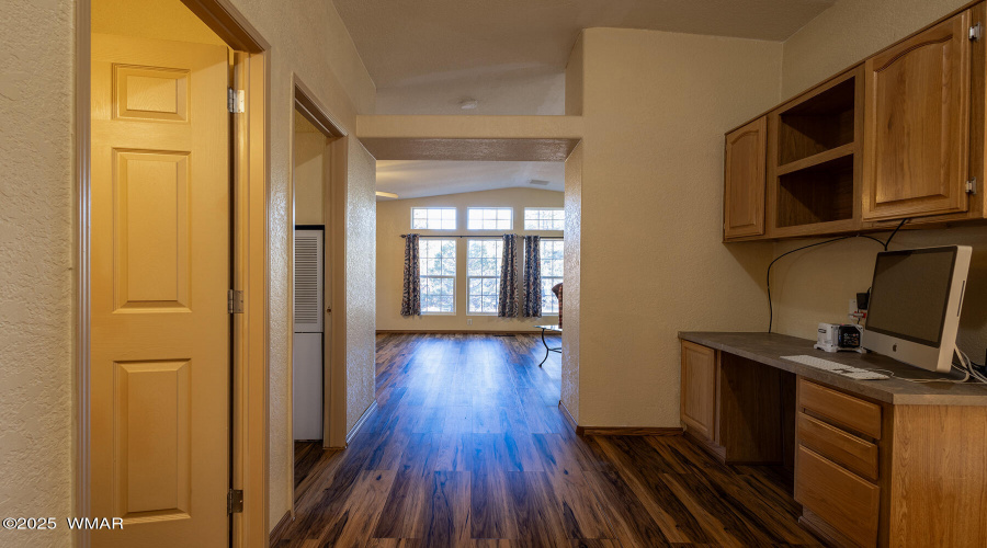 Hallway with built in desk