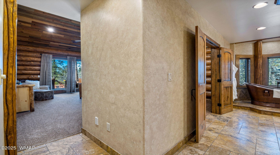 Primary Bedroom into Bathroom