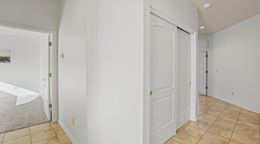 Spacious Linen Closet in Hallway