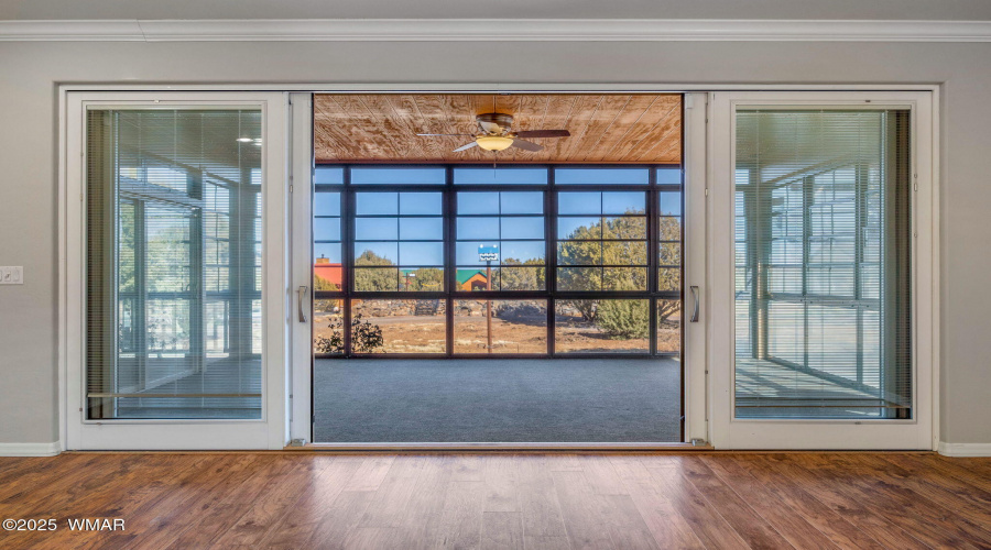 Living Room Looking out to Sunroom