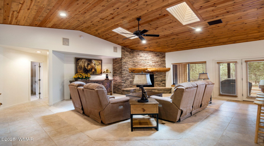 Living Room with Stacked Stone Fireplace