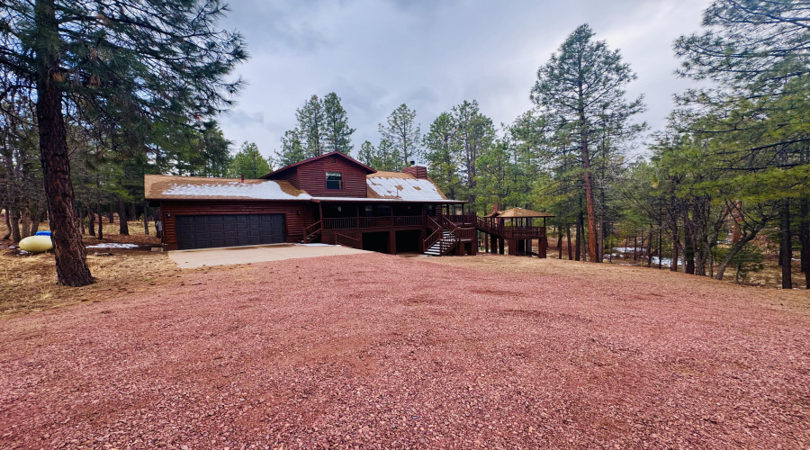 Large gravel drive &bconcrete parking
