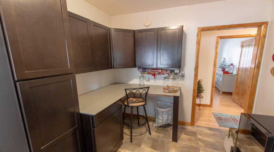 Laundry with Craft Table & Cabinets