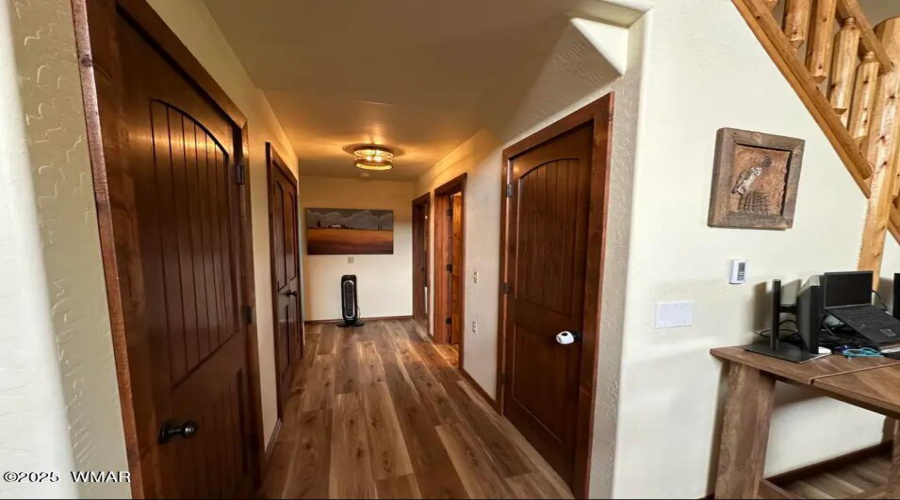 MAIN FLOOR - Hallway looking to bedrooms