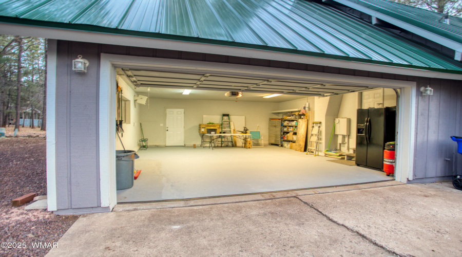 Organized 2-Car Garage w/Heat