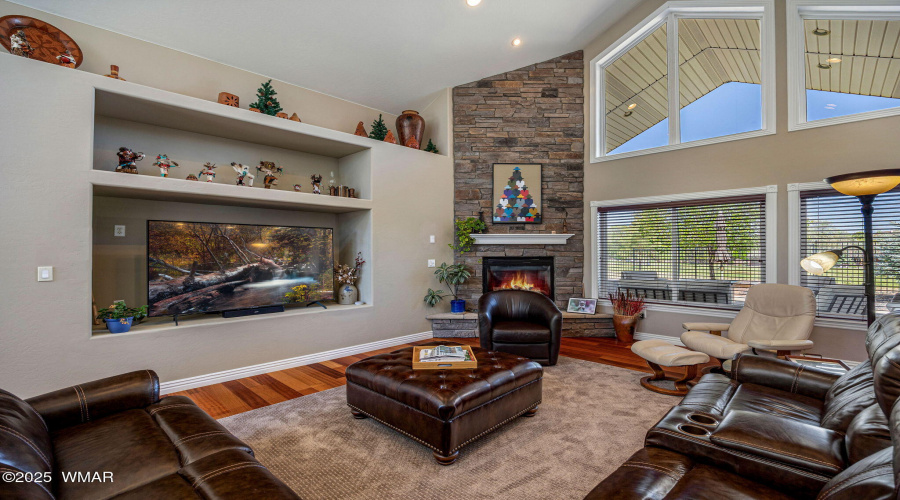 Floor to ceiling stone fireplace