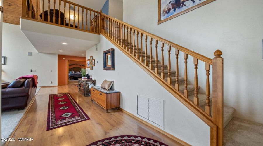 Stairs to loft and 2 bedrooms