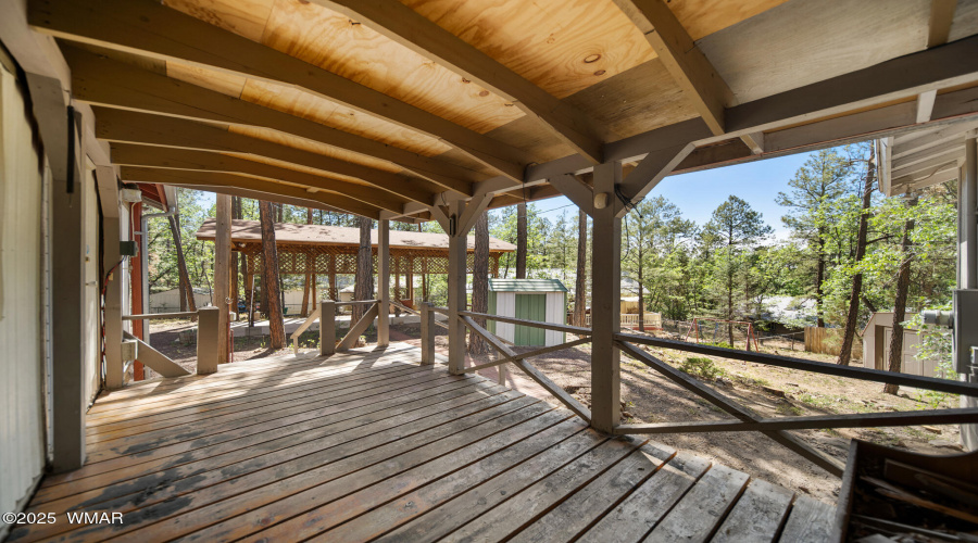 S covered deck view to carport