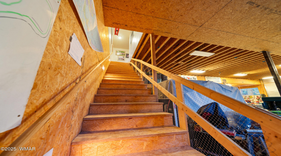 F stairs in work shop to up bunk room