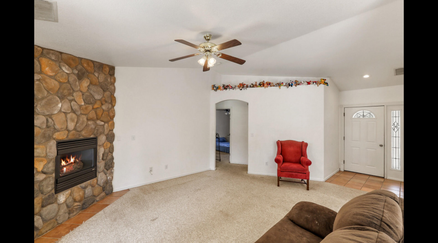 living room with frplc