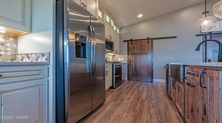 Barn door to laundry and garage
