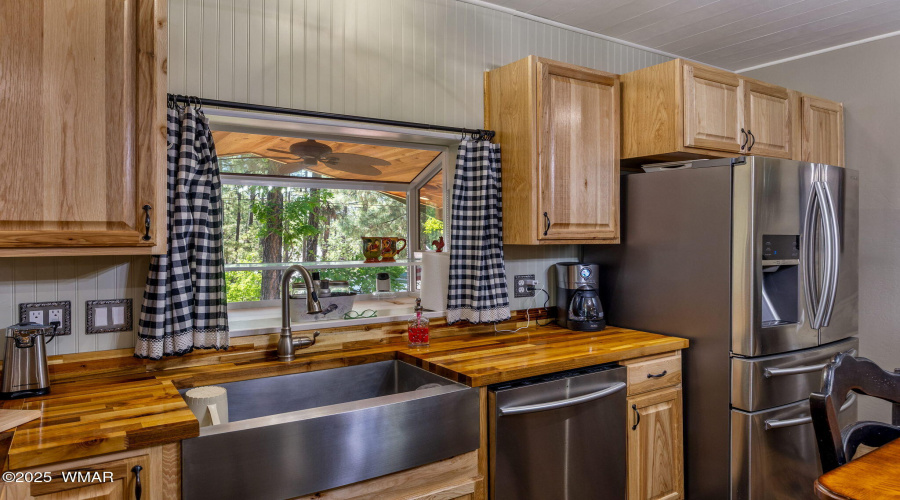 Farmhouse Sink and Wood Countertops