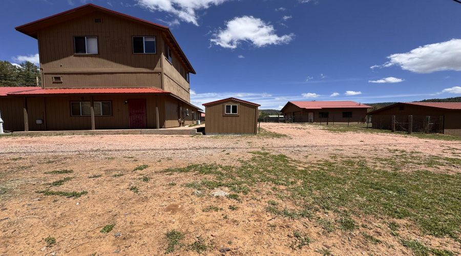 6 - Main home, shed, storage house and 2