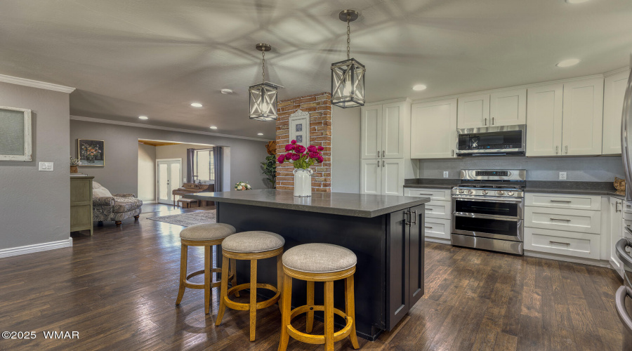 Kitchen with view into living room