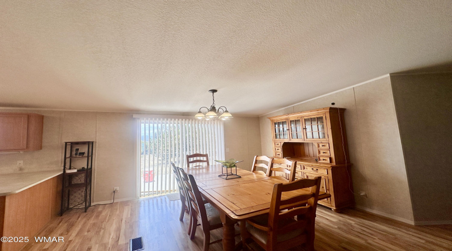 LARGE DINIG ROOM WITH PATIO EXIT