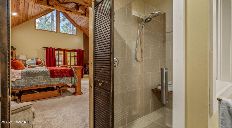 OWNERS SHOWER BEHIND SOAKING TUB