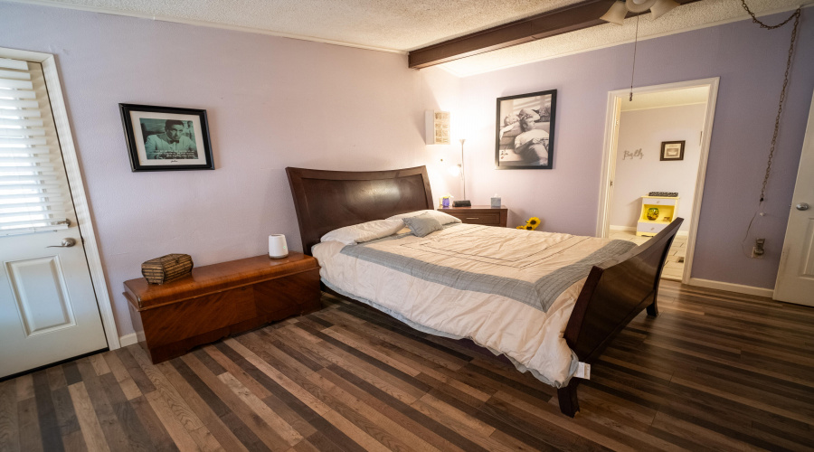 Main bedroom with door to yard